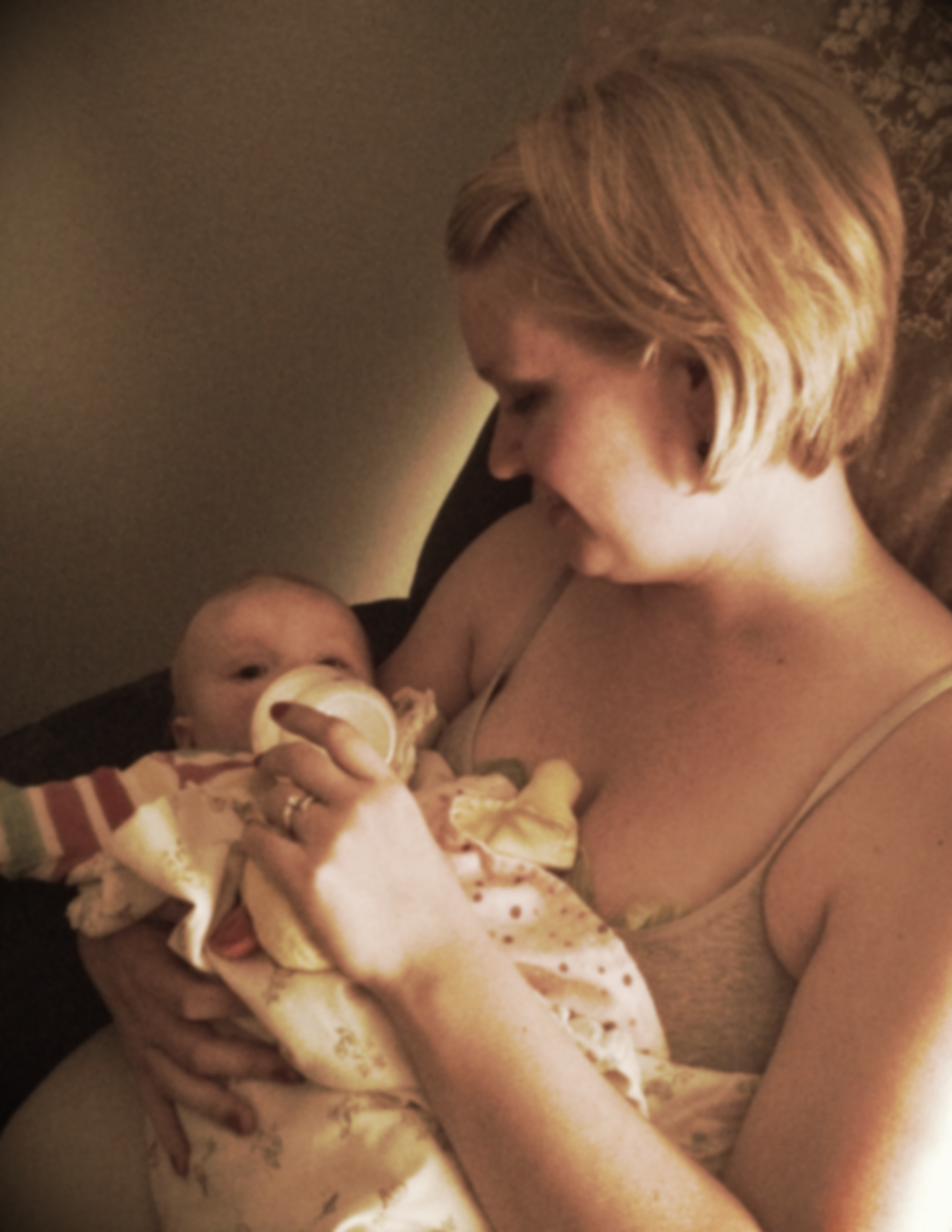 Here we are after the transition was complete, one day before her first birthday. What a happy little bottle feeder!