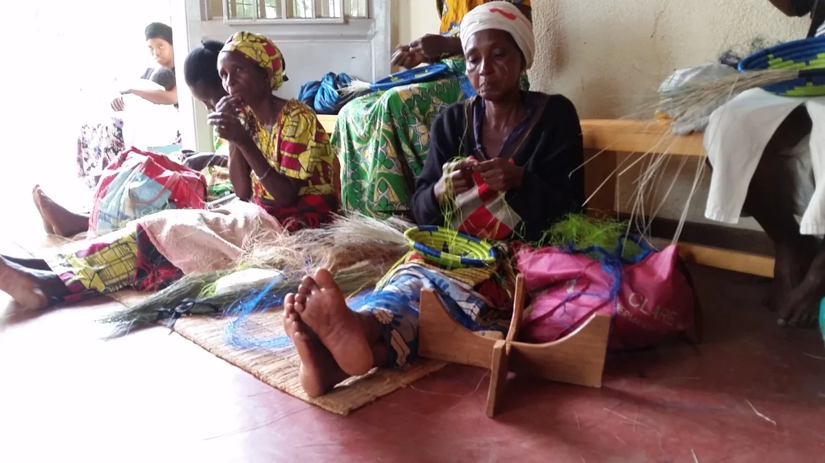 Basket weavers at the Indego Africa’s Women Artisan Cooperative