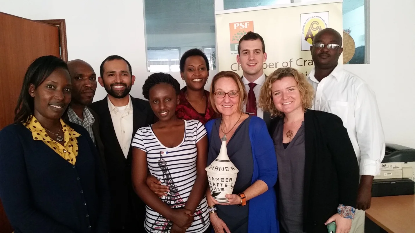 Members of the Chamber of Craft, Art and Artisans, Israel Moya from U.S. Embassy Kigali, Chase Ballinger from the State Department, and Peggy Clark and Katie Drasser from the Aspen Institute