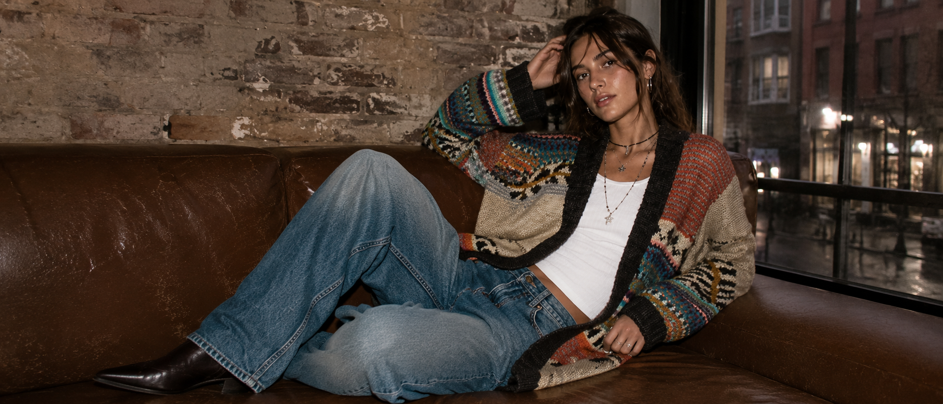 Model wearing a handmade Artisan Alliance cardigan
