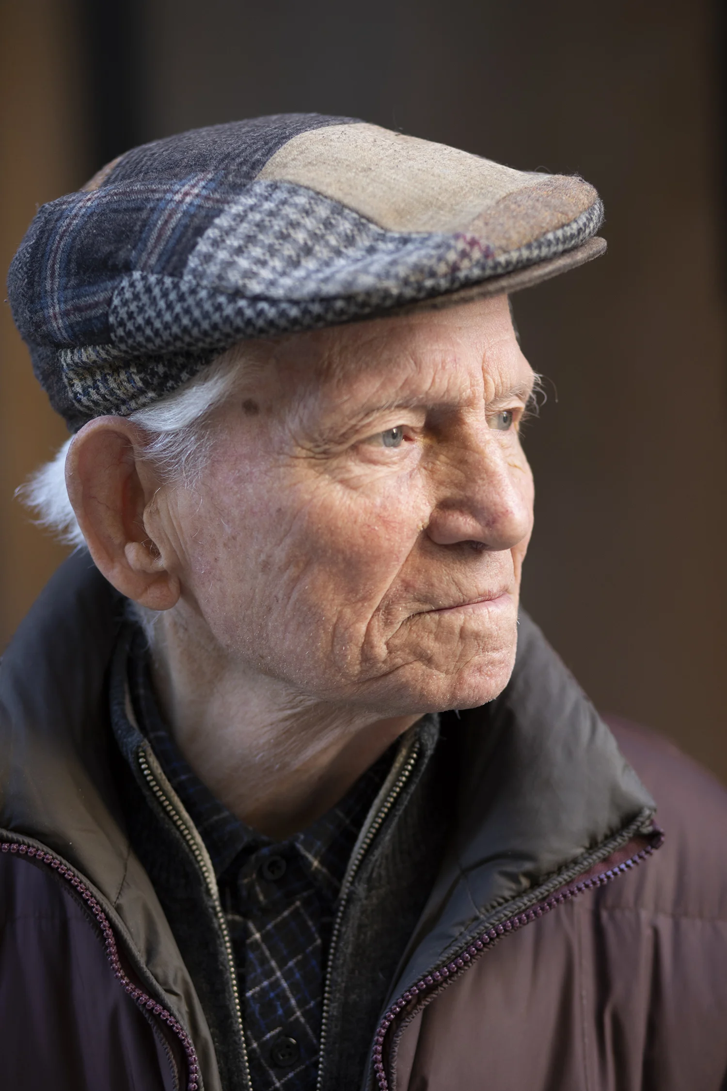 Man in Plaid Hat