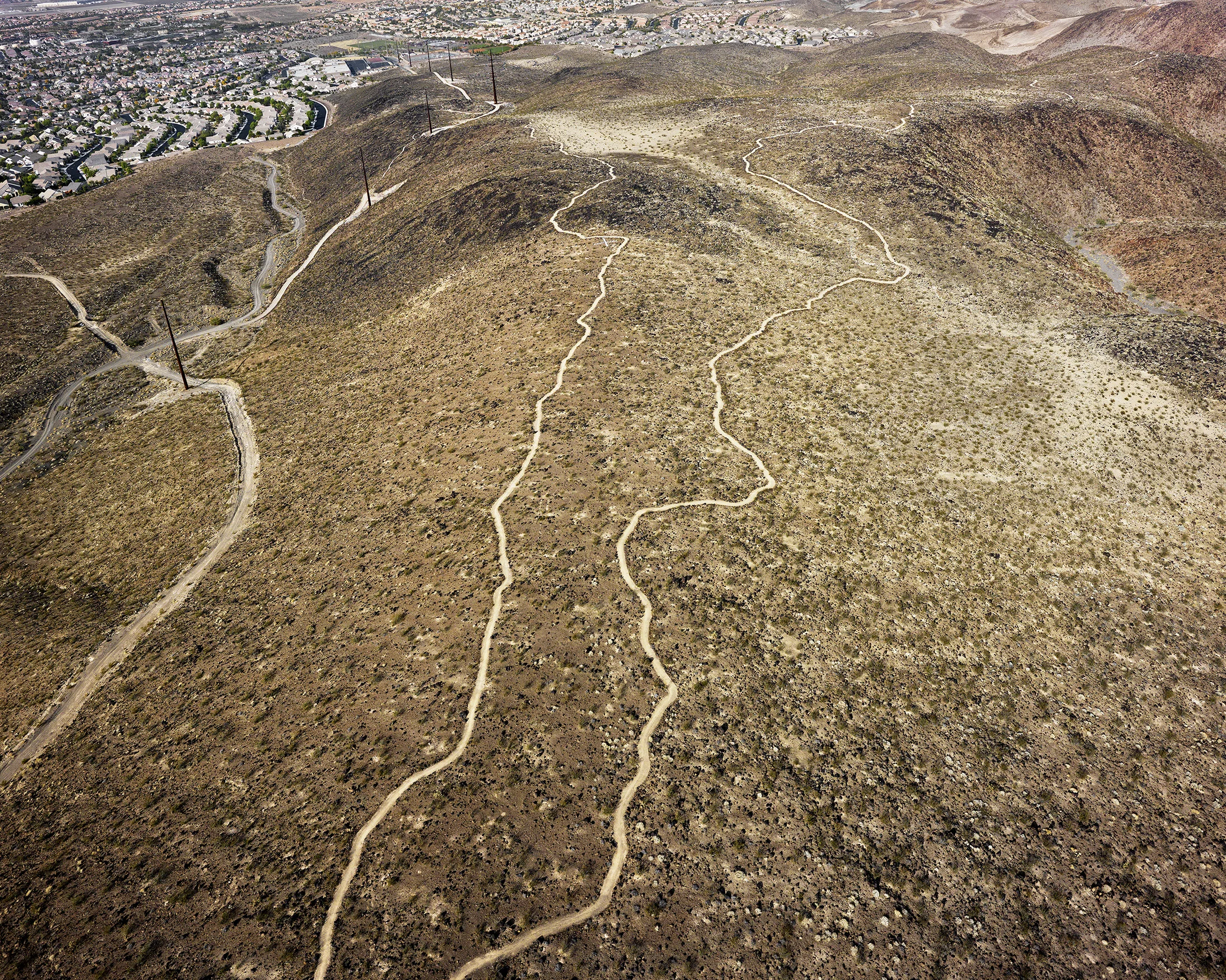 01. Bursage Loop trail looking northwest, “Del Webb Anthem” homes beyond, Henderson, Nevada; 2010