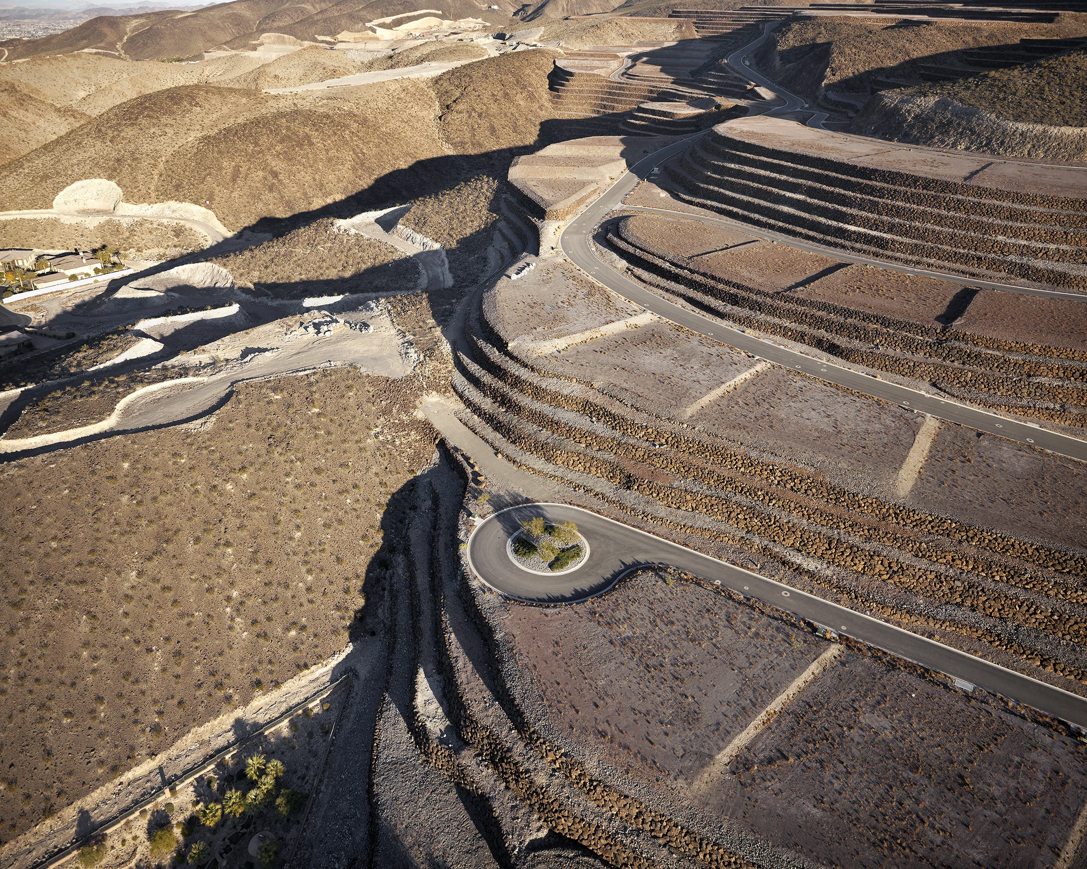 13. Edge of unbuilt “Ascaya” development looking east; foreclosed “Obsidian Mountain” development at left, Henderson, Nevada; 2011