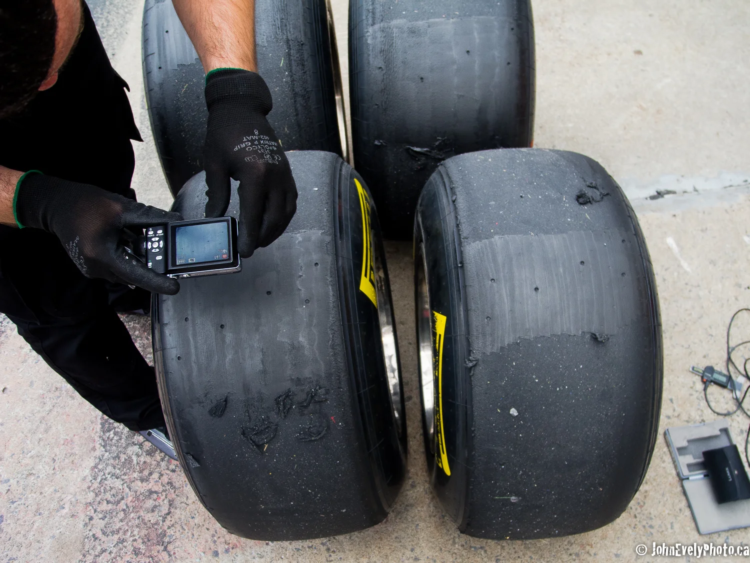 Pirelli tire tec measures tire degradation in the Red Bull pit.