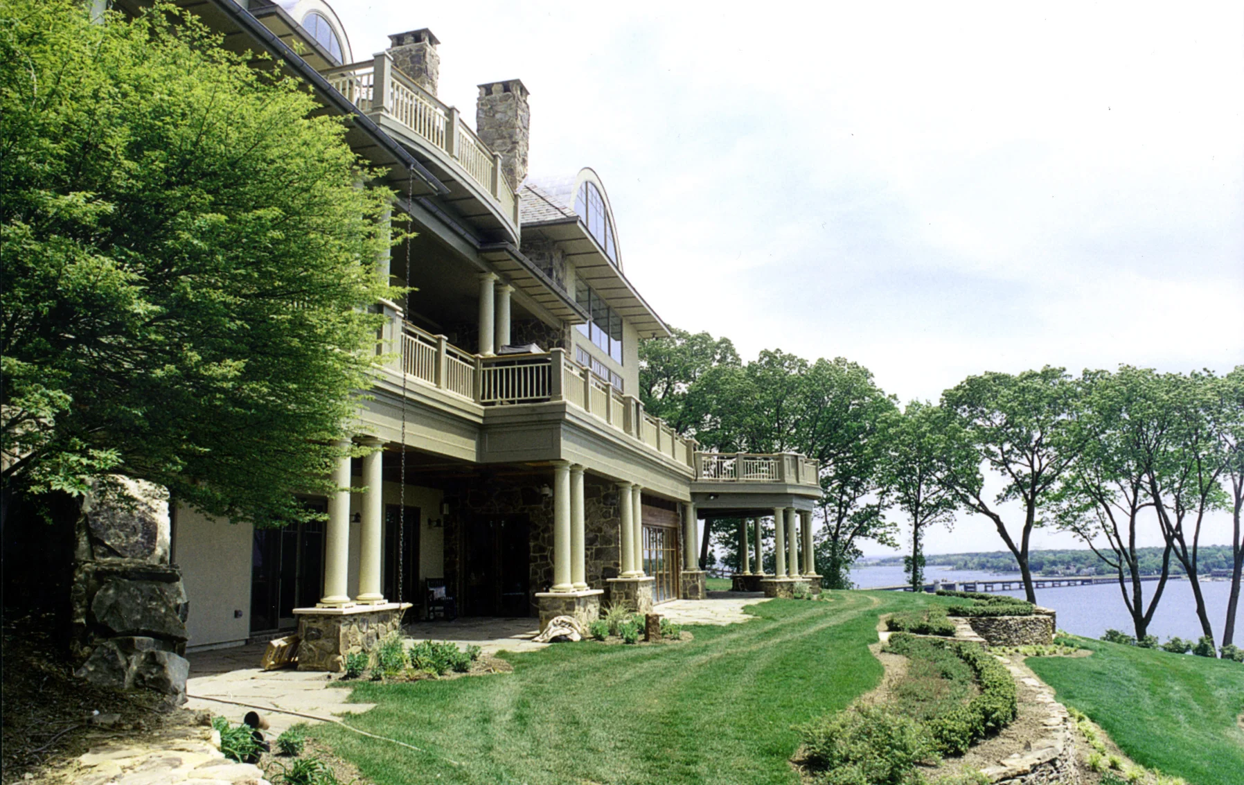 Navesink River Road | The challenge of this site included a 120’ drop to the water’s edge from a panoramic view of the picturesque Navesink River. The home’s program consists of comfortable and stylish spaces for daily living along with grand rooms for lively entertainment including Racquetball court, enclosed swimming pool, and home theater.