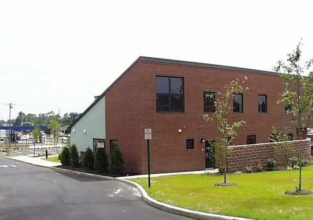   Chapel Hill Dental Arts | &nbsp;Is a full service dental facility with patient areas and areas devoted to the manufacturing of porcelain prosthetics.&nbsp; The building sits on an extremely busy state highway.&nbsp; The design successfully shields 