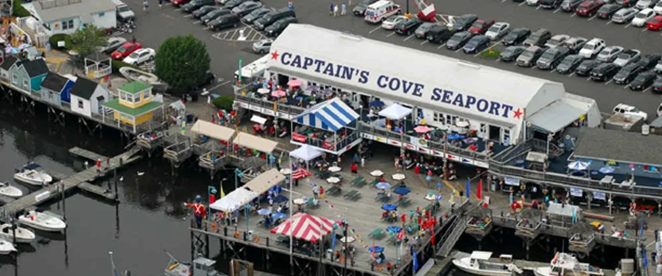 PHOTO CREDIT: Above photo of Captain’s Cove Seaport, is from&nbsp;here.&nbsp;