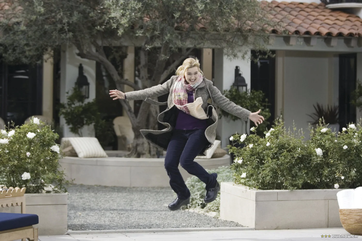 PHOTO CREDIT: Above photo of Iris by the pool is from outnow.ch .