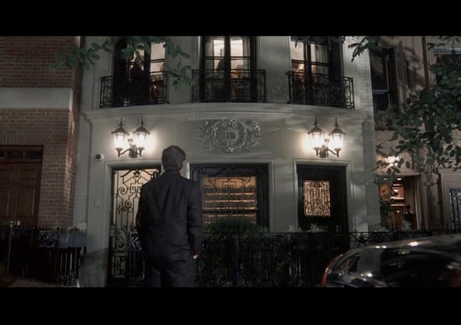 PHOTO CREDIT: Above photo is a screenshot from the movie of Harry standing in front of his New York townhouse.