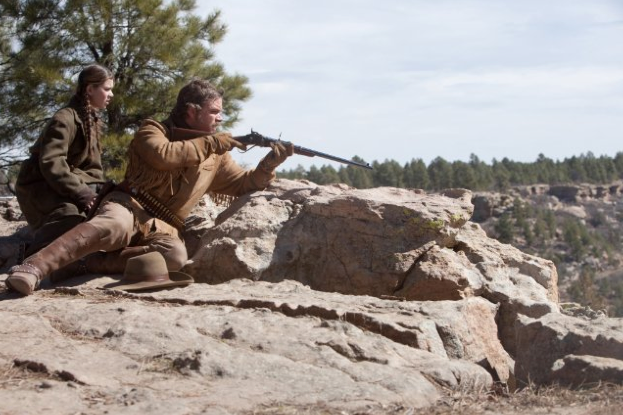 Production still of True Grit - filmed in Austin, Texas - via IMDb .