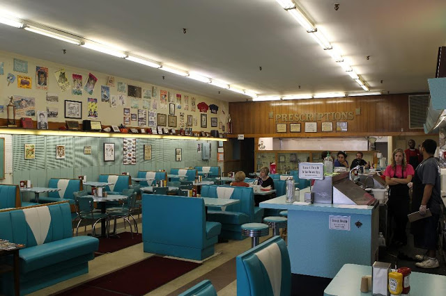 Photo of Brent’s Drugs interior is from here .