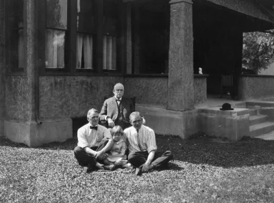 Photo above of Paris Gibson, his son, grandson and granddaughter in front of the Gibson House - courtesy of Kelly Parks.