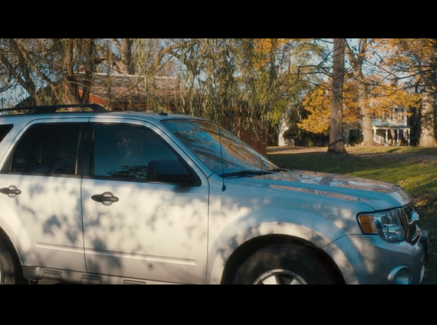 Screenshot:&nbsp; Peter Olsson's house as seen from afar by Philomena and Martin (both in the car).