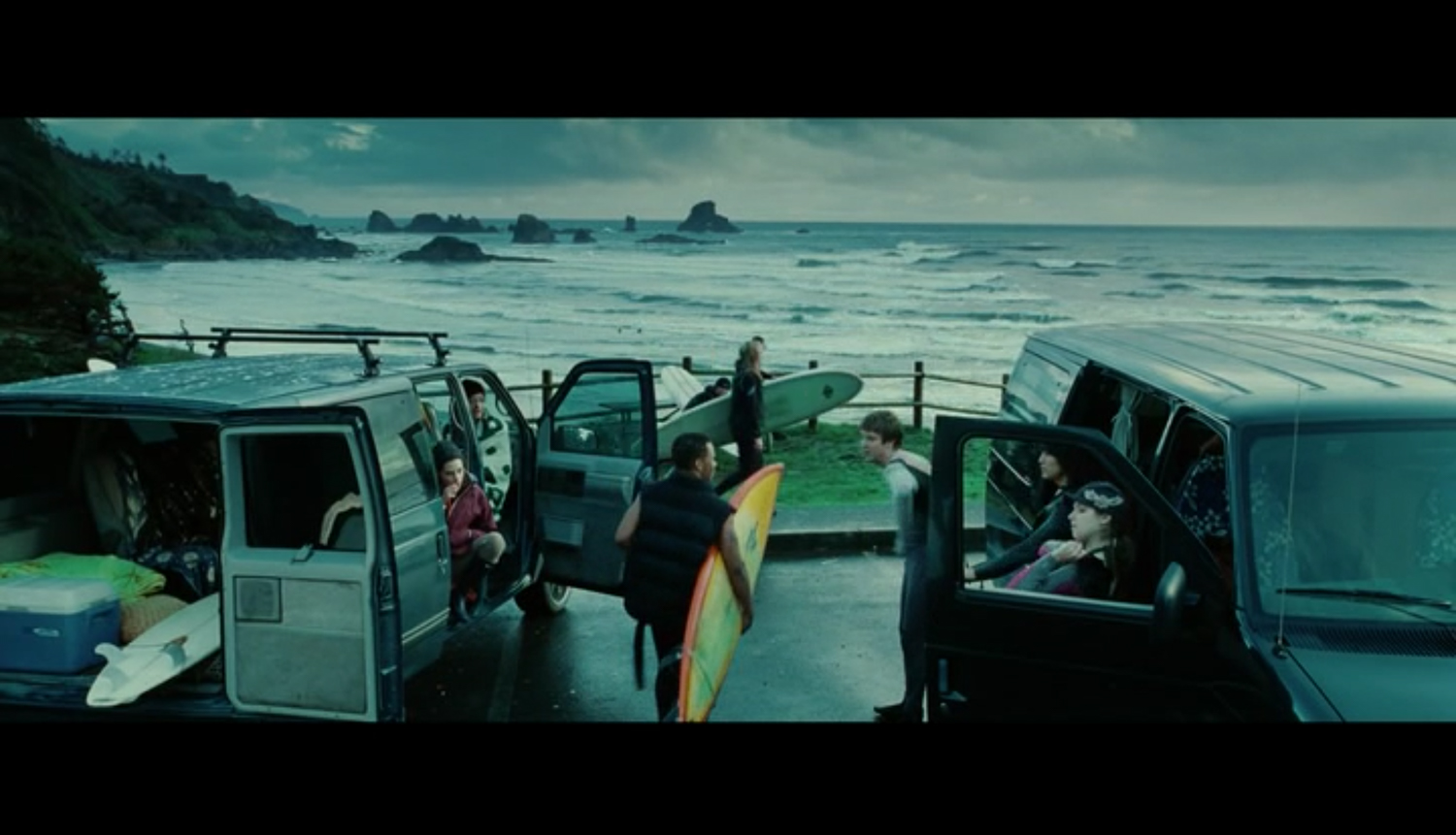 Screenshot from Twilight of a scene filmed at Indian Beach - where Bella's friends are getting ready for a day of surfing fun. For this scene, Indian Beach stands in for First Beach, a real-life beach in La Push, Washington.