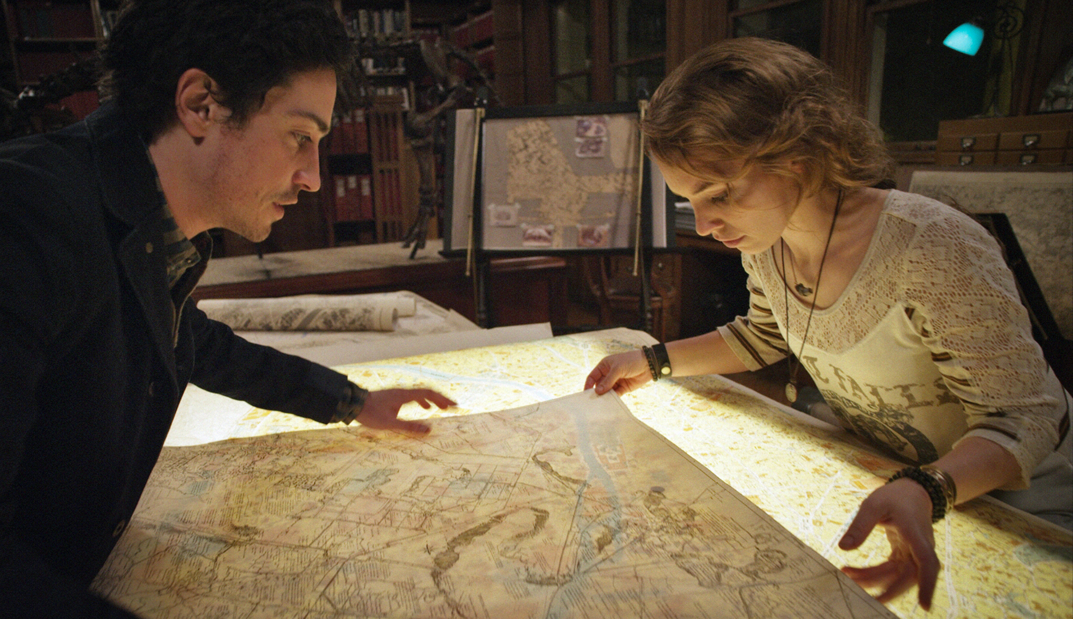 Production still from As Above, So Below featuring actors Perdita Weeks (Scarlett) and Ben Feldman (George) - image via Google .