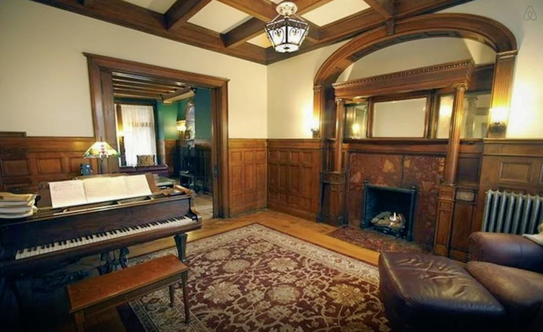 The music/reading room at 82 Alfred Street today. The property is now available for rent via Airbnb.com. Image via Airbnb.
