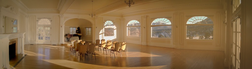 The Music Room at the Stanley Hotel - where guests sometimes hear piano playing even though no one is sitting at the piano. Image via Google.