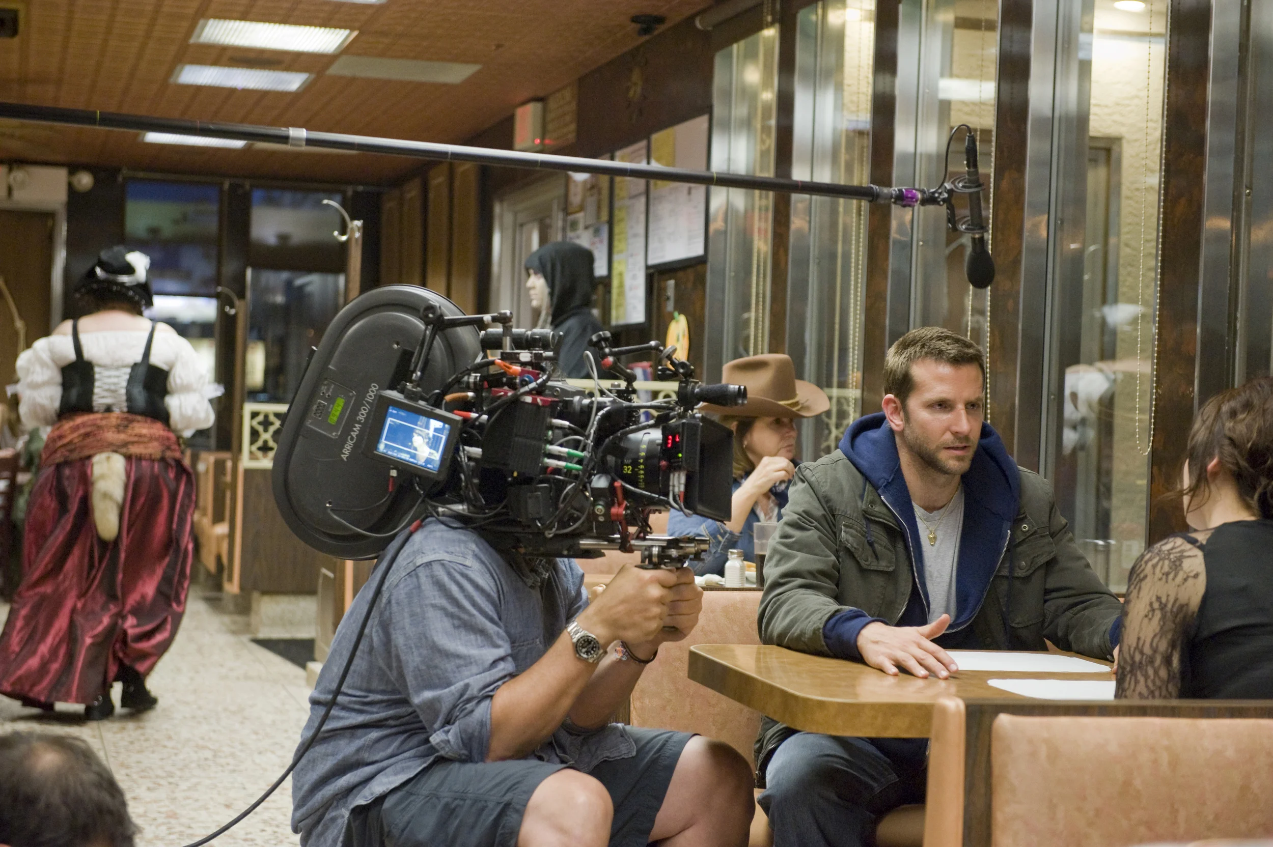 A behind-the-scene look on the set of Silver Lining Playbook, also filmed in Philadelphia (at the&nbsp;Llanerch Diner in this scene), featuring Bradley Cooper and Jennifer Lawrence - image via Google.