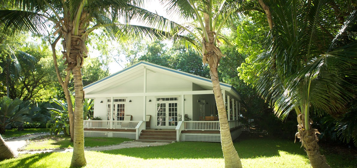 A charming cottage at the Moorings Village & Spa - image via the resort's website .