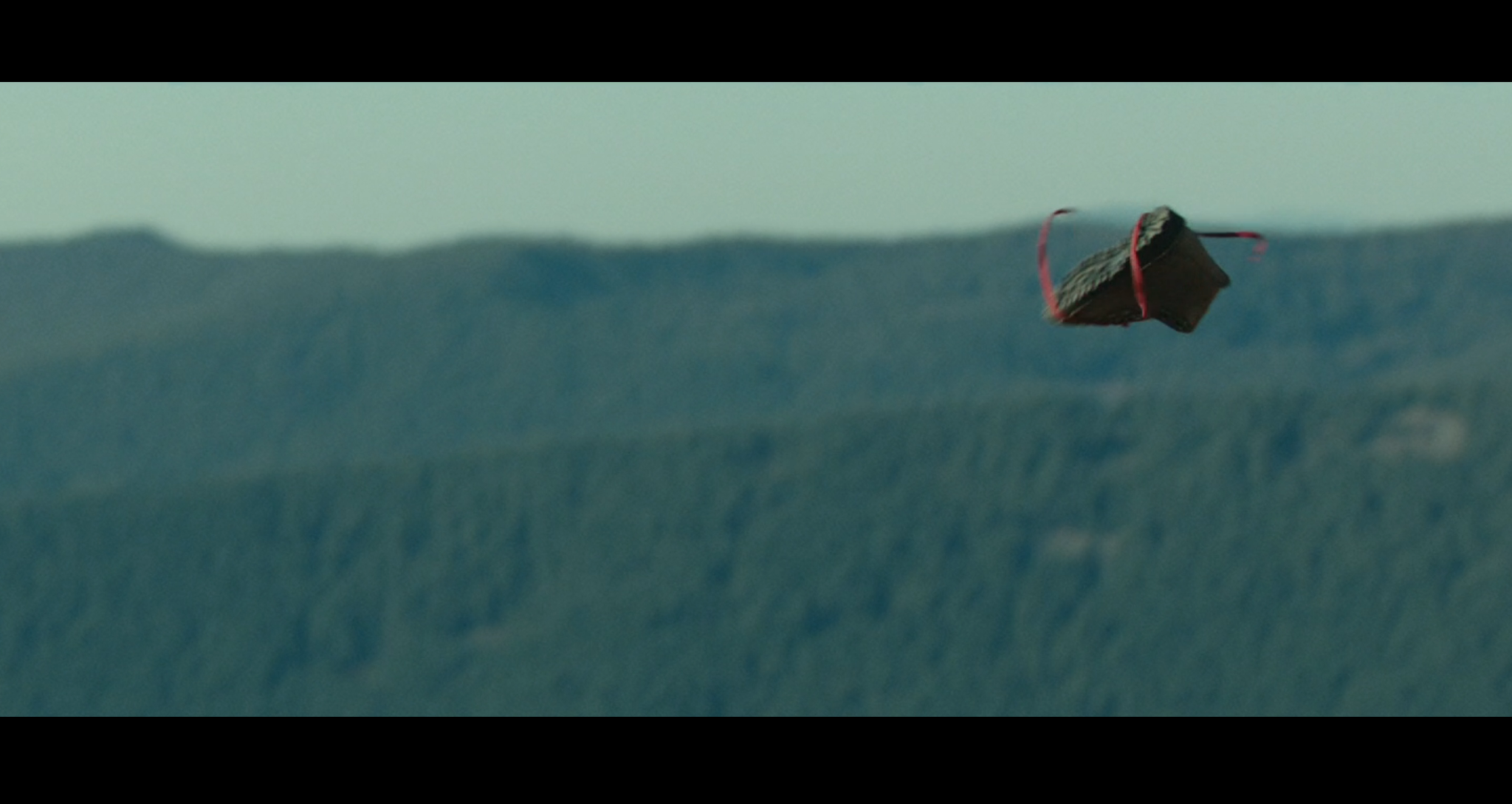 Screenshot of the famous boot drop scene in Wild - filmed on location on Mount Hood Ski Bowl area.