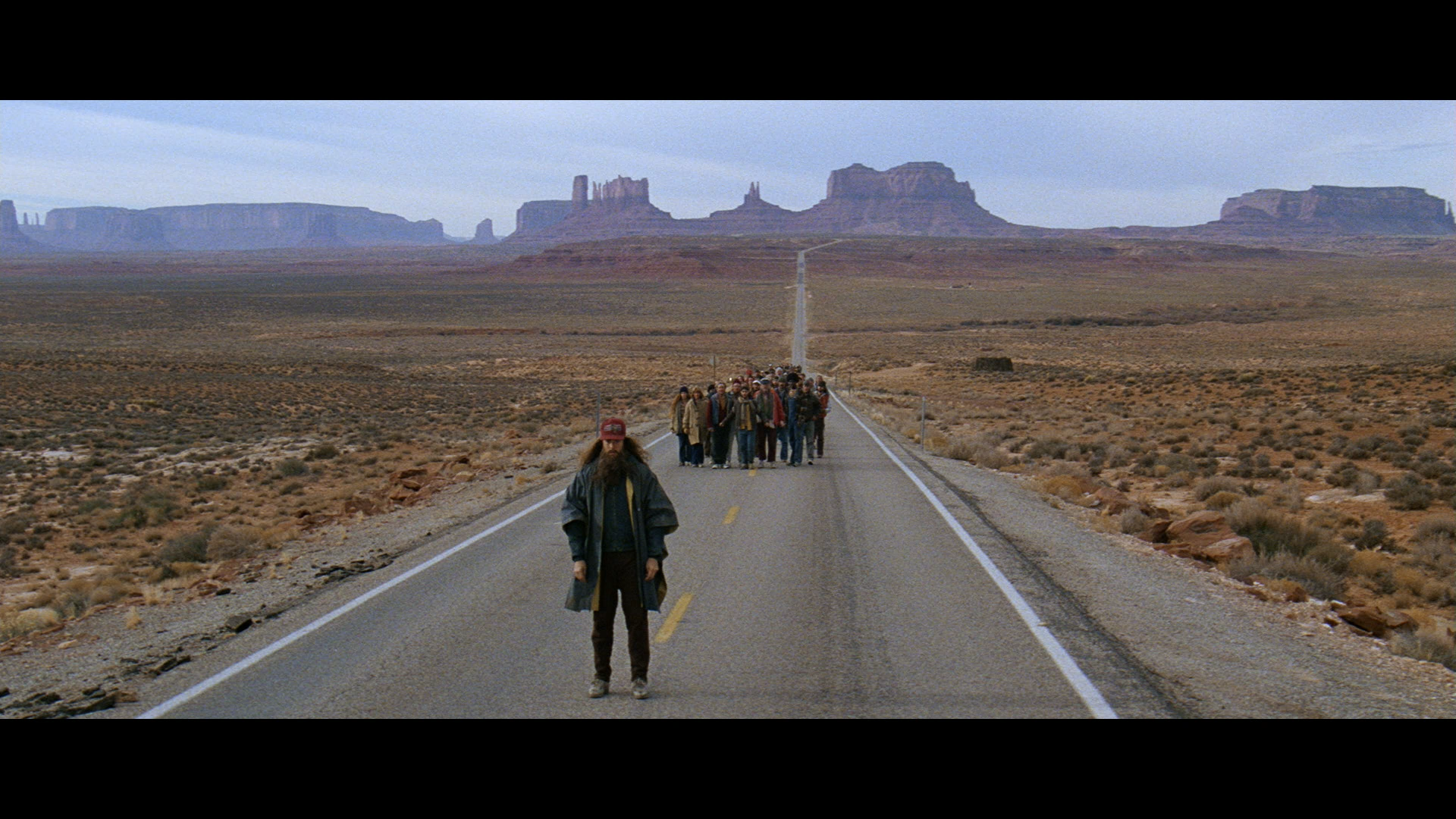 Screenshot of a scene from Forrest Gump, filmed at Monument Valley.