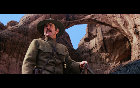 Screenshot of a scene from Indiana Jones And The Last Crusade filmed at the Double Arch in the Moab.