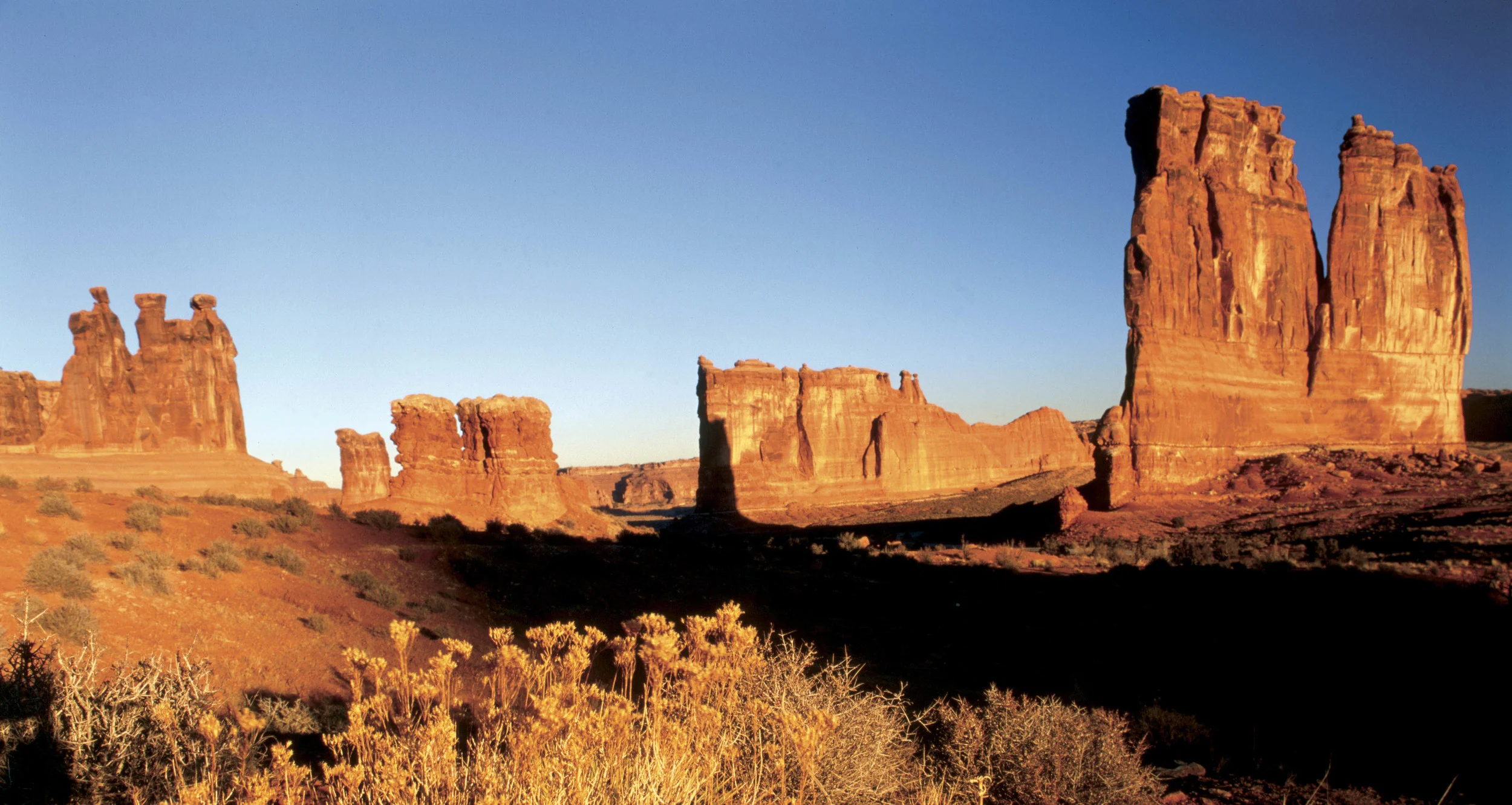 The Courthouse Towers in the Moab area - an iconic film location as featured in Thelma &amp; Louise. Image via Google.