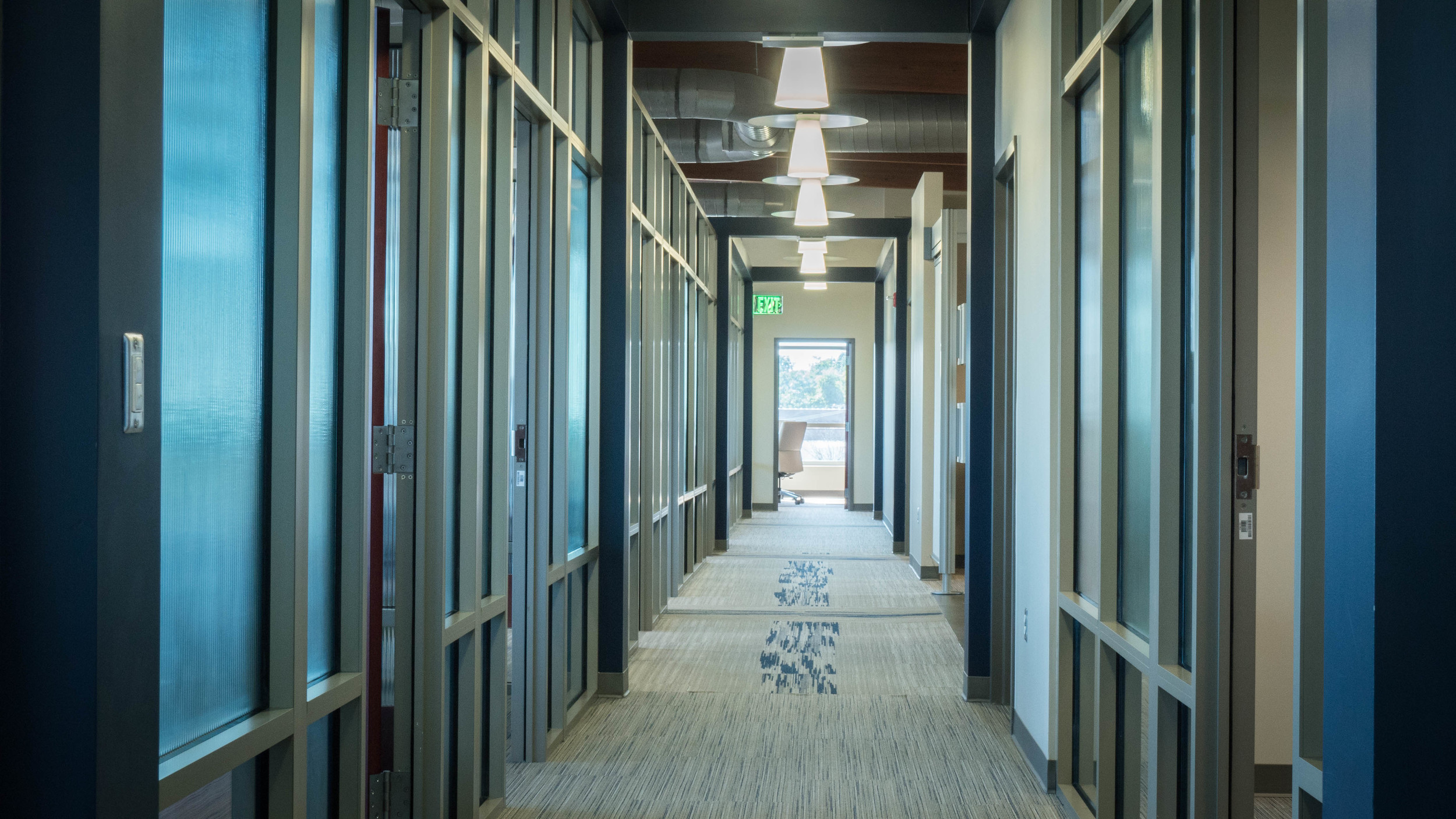 A hallway on the third floor where the offices are located.