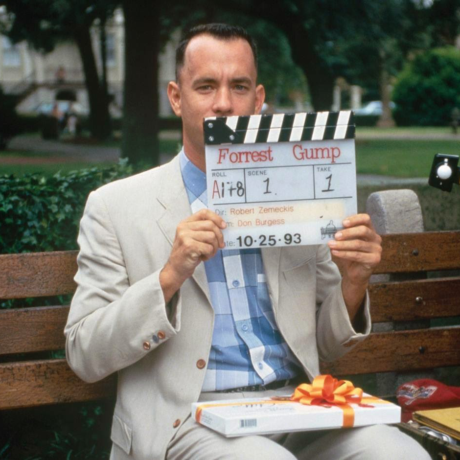 Tom Hanks on the famous bench from the Savannah film set of Forrest Gump - image via Google).