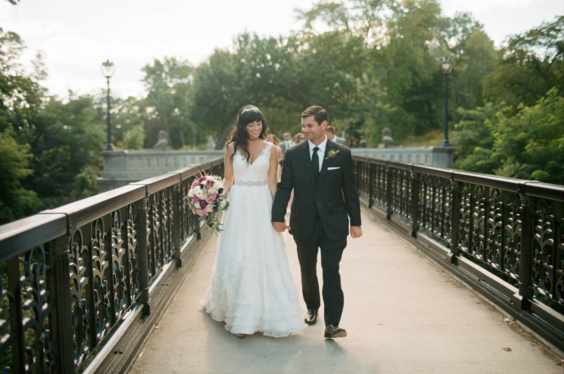 Lake Park Bridge/ Lake Park Bistro. Best in summer for the green, but can also work in summer if there is snow on the ground and snow in the trees (freshly fallen). May be kicked out if there is a wedding going on at Lake Park Bistro that day - so need to be flexibly if you choose this location for your wedding day. Covered white space at Lake Park Bistro also works well if its raining.