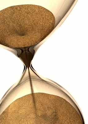 Sand thru hourglass.jpeg