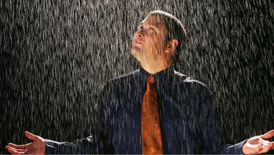 man standing in rain.jpg