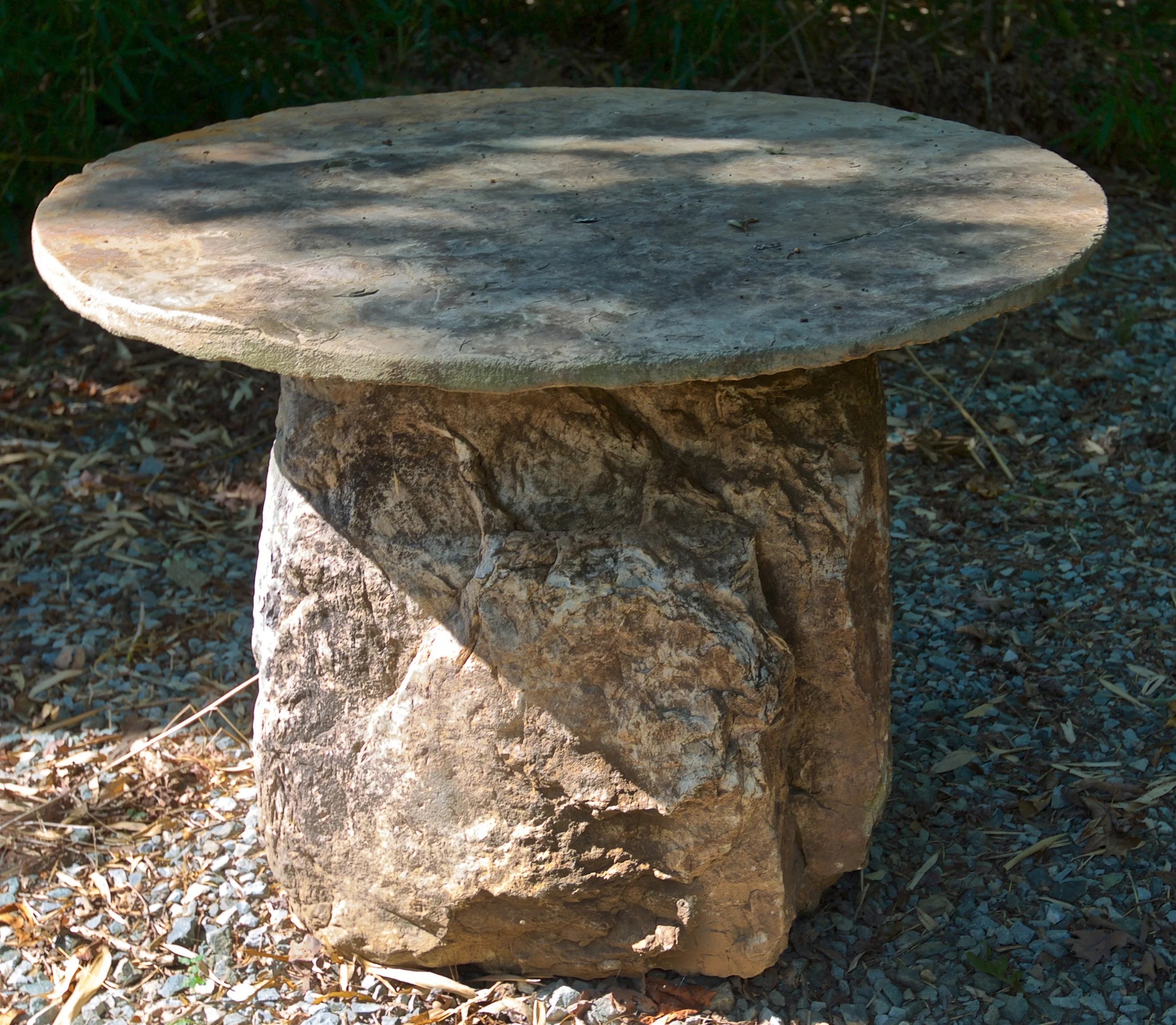 round stone table nature stone bottom sandstone.jpg