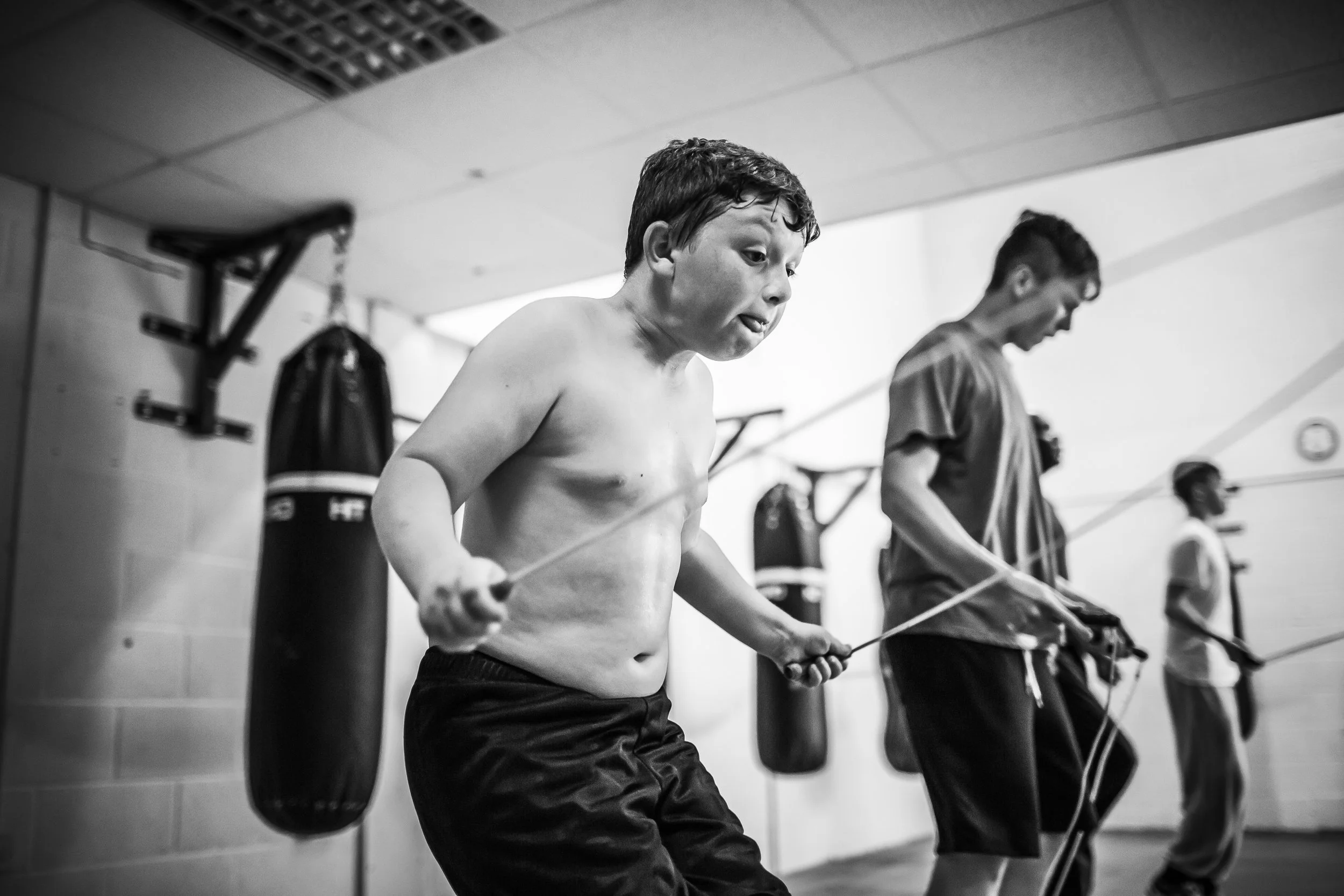 South east brand and reportage photographer, boxing, boy skipping, gym, 