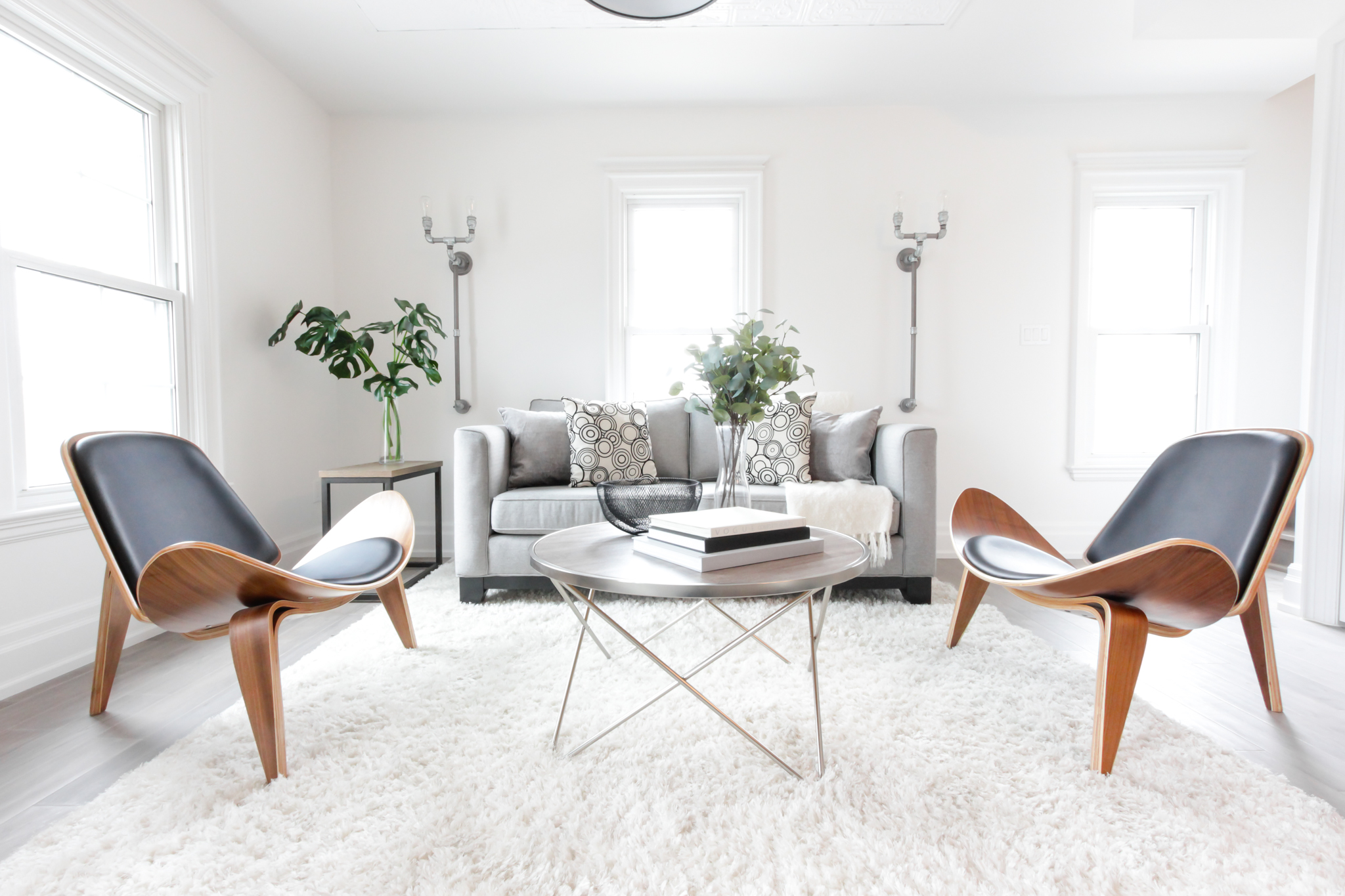 Living Room Home Staging in Barrie. Cool modern chairs add style and sophistication to this home for sale