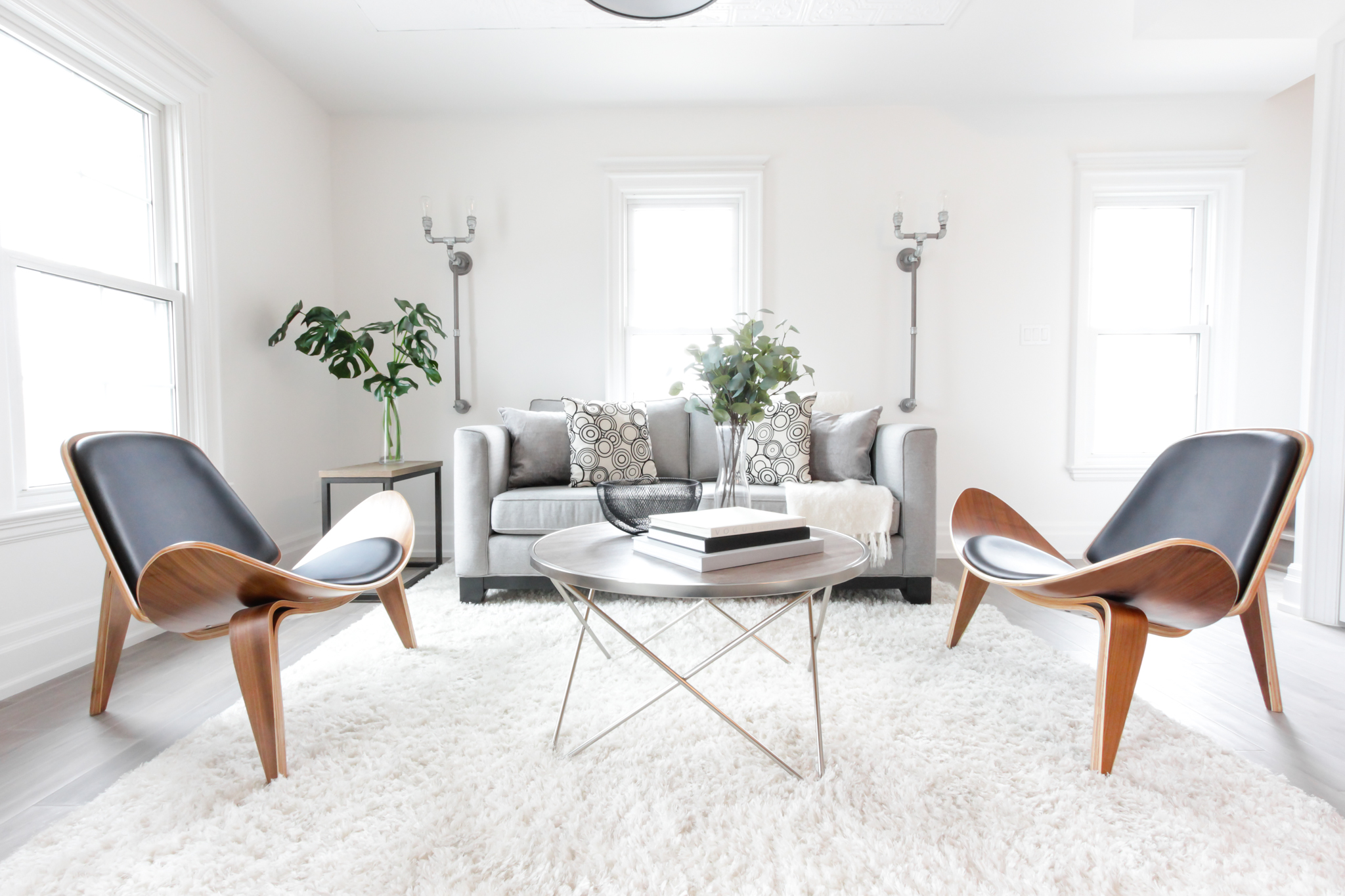 Home Staging project in Mississauga condo. Classic mid century modern chairs add sophistication and elegance to their condo