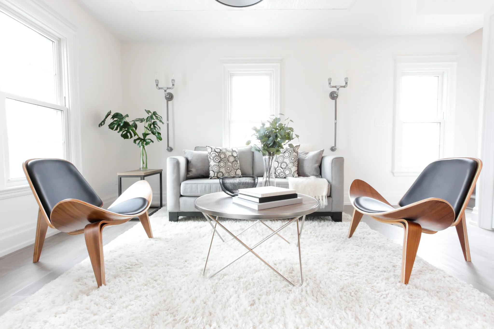 Home Staging project in Mississauga condo. Classic mid century modern chairs add sophistication and elegance to their condo