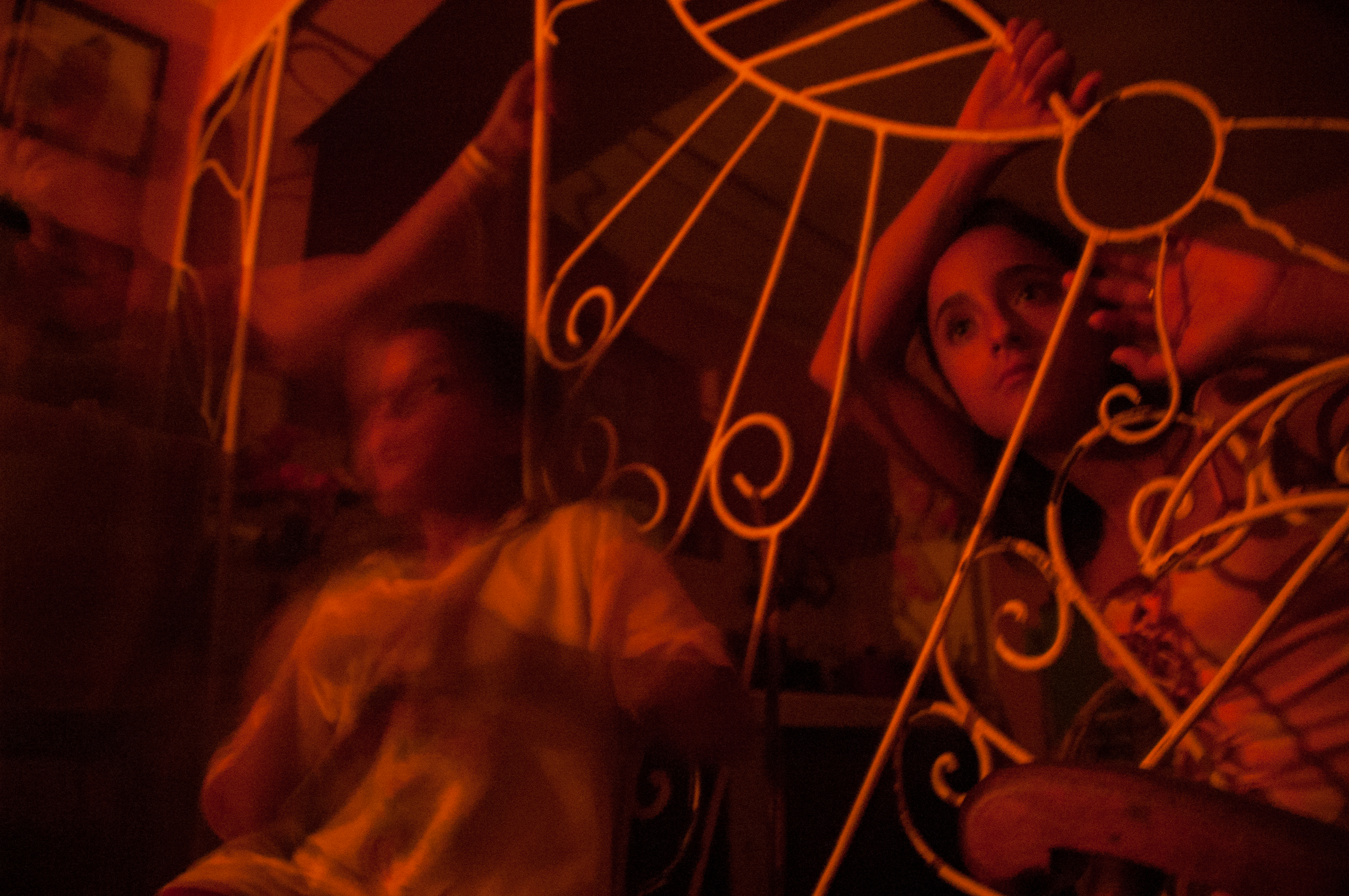 A family passes time by candlelight during a blackout, Santiago de Cuba, Cuba.