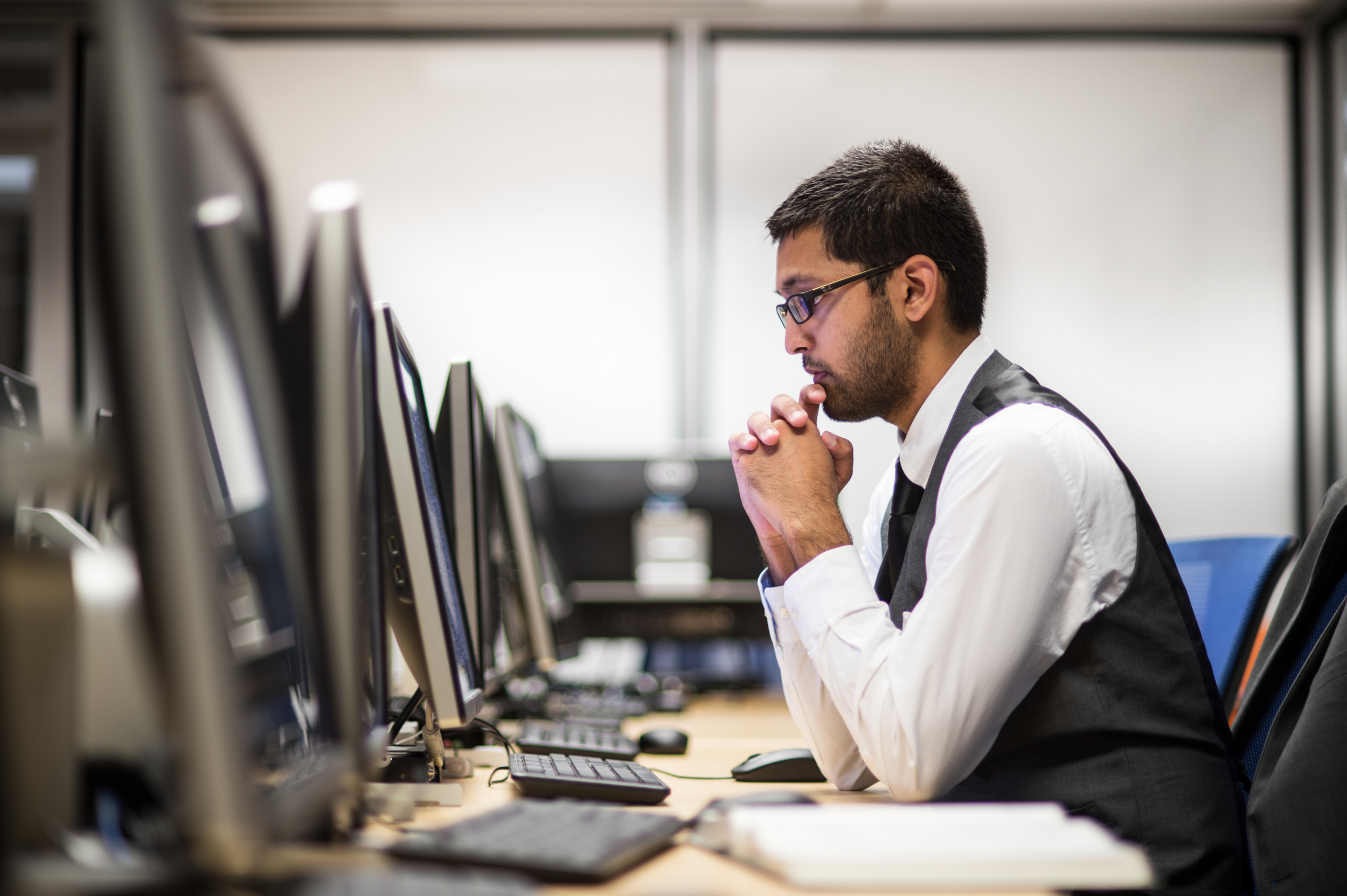 A student works in the computing facility, George Washington University, Washington, DC