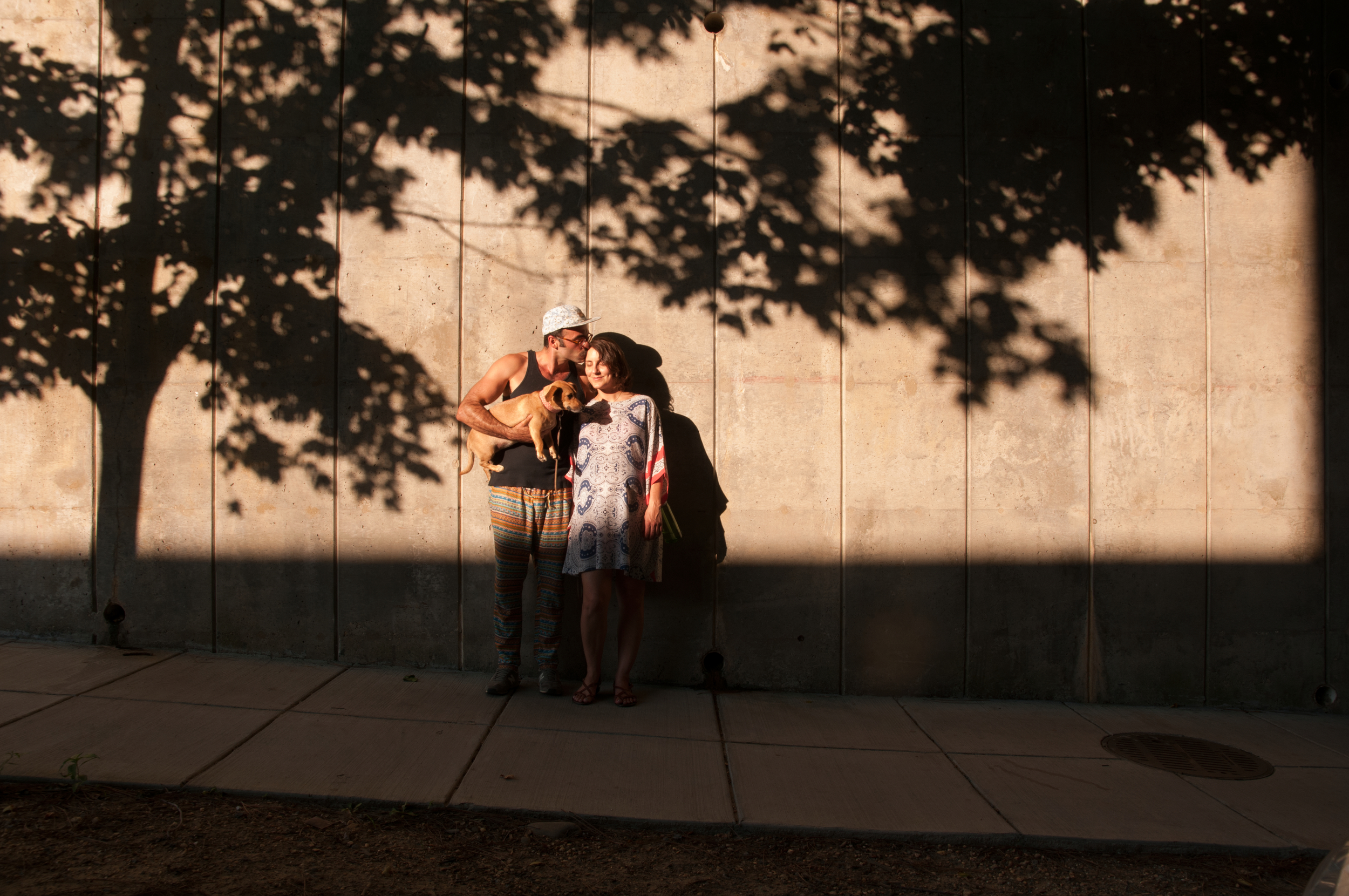 Omid, Jasmine, and Sage (in utero) out on a walk with their dog Paloma, Washington, DC 