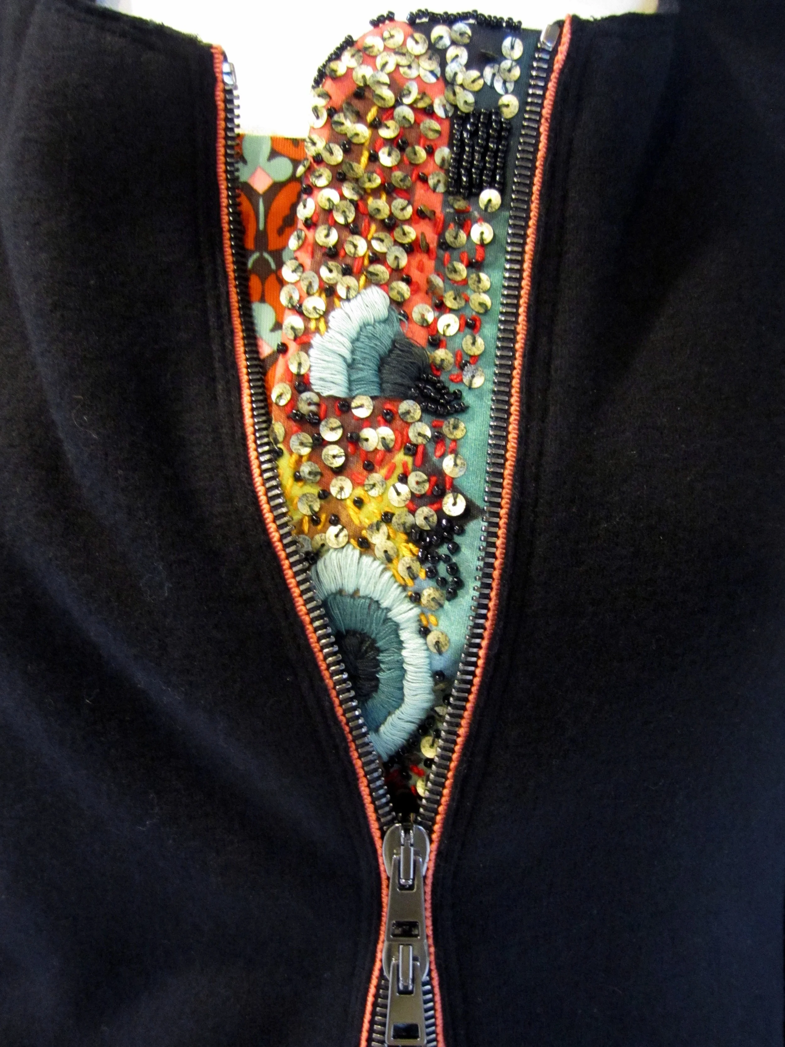 Embroidered and Beaded Zipper Placket.