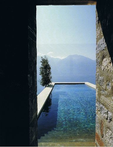 Poolside mountain views, Italy.