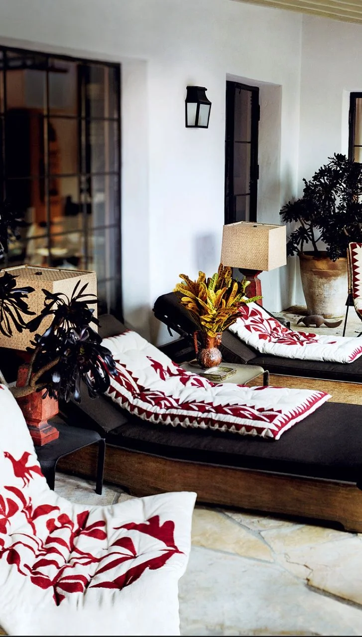 Mario Testino's Los Angeles home featuring Mexican Otomi pattern embroidered outdoor lounge chair pillows photo via Beautiful Porches and Patios