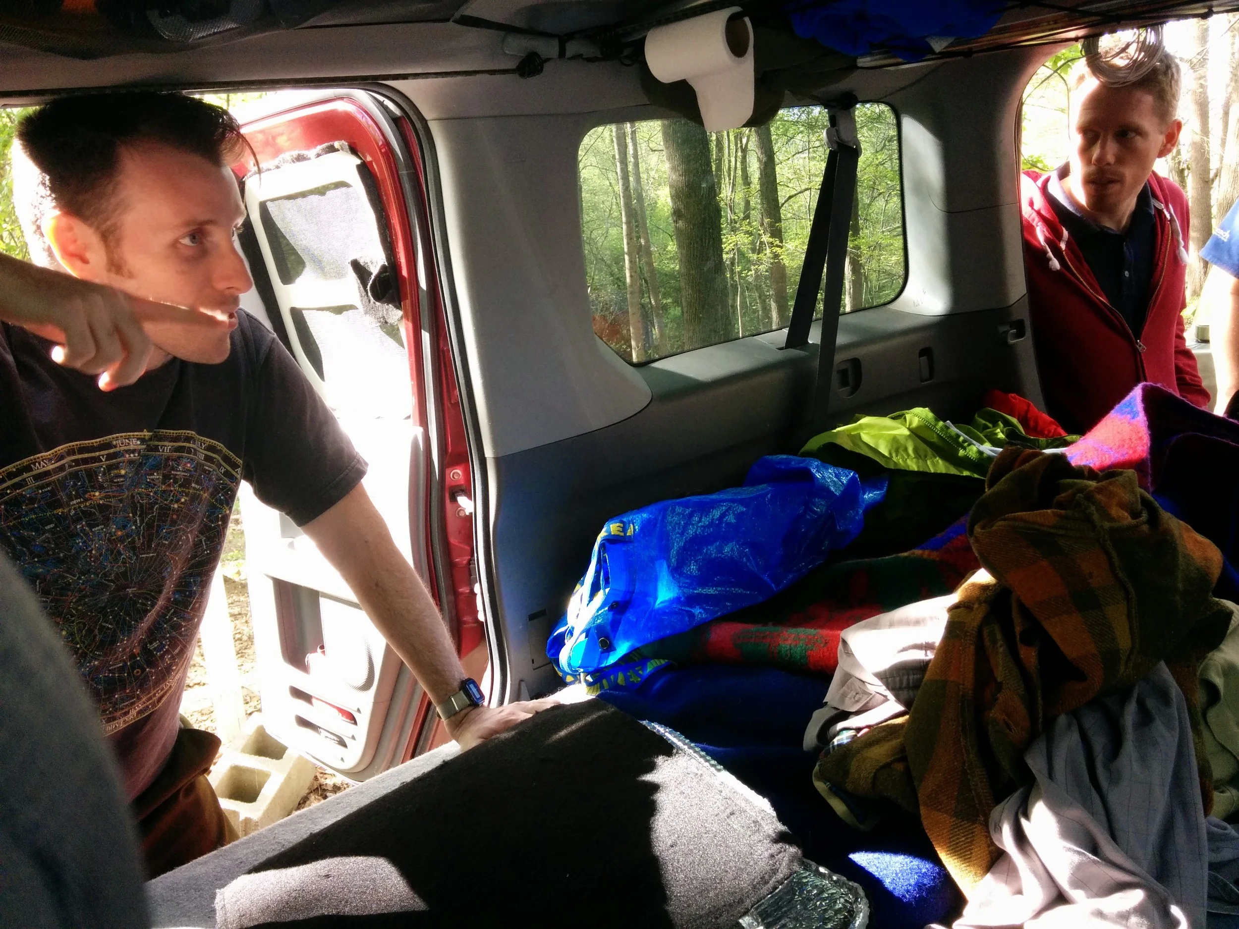 Giving a tour of our Honda Element micro-camper that we travel and live in while we're on the road for longer trips.