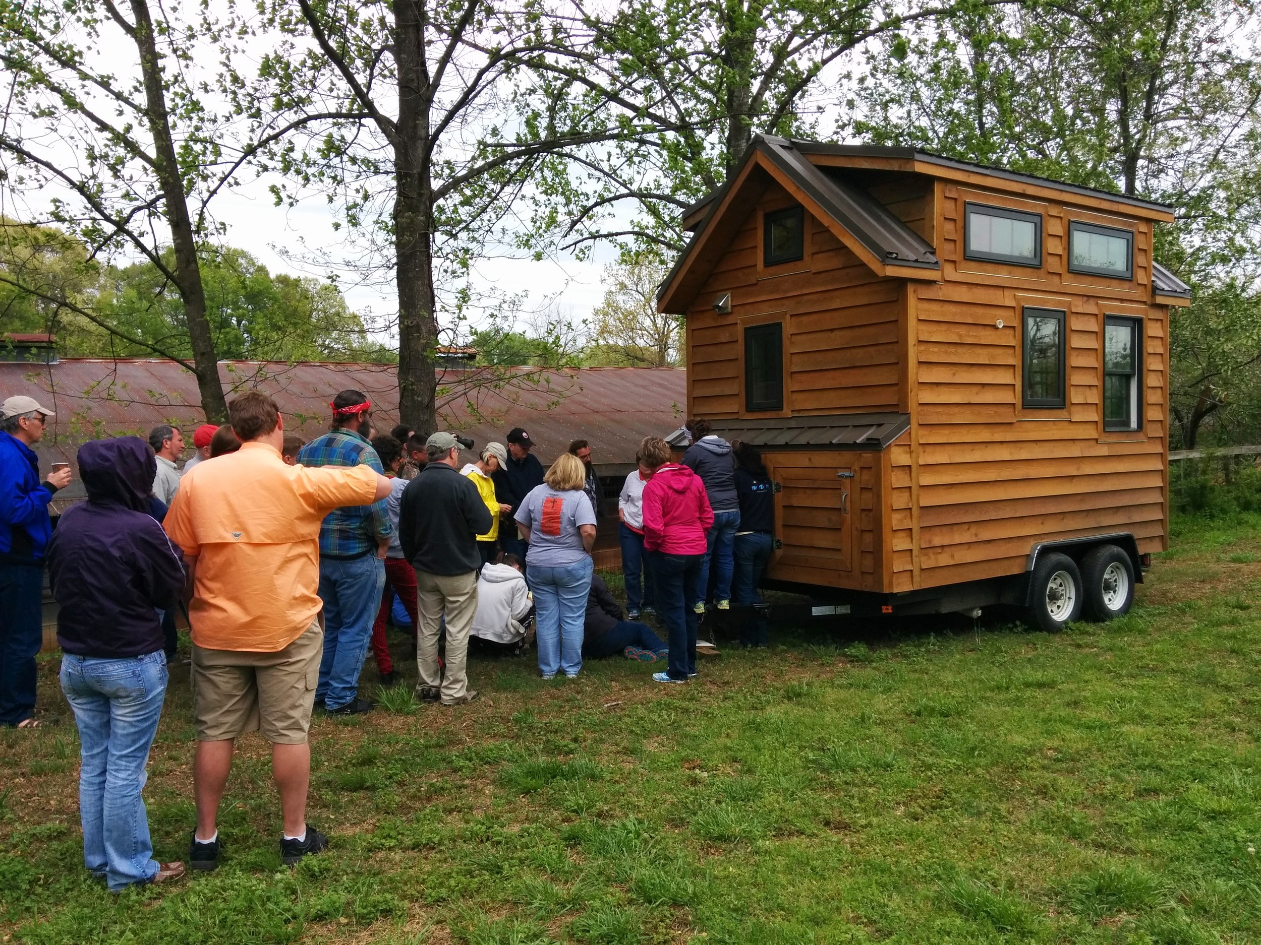 Dan gives everyone an inside look at how the electrical system in the tiny house is wired up and participants can see how everything works on a real tiny house.