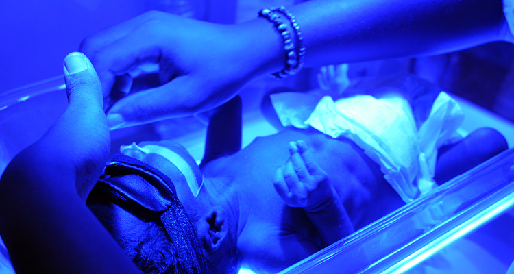 Firefly phototherapy treats first newborn in Haiti at the neonatal intensive care unit at Saint Boniface Hospital.