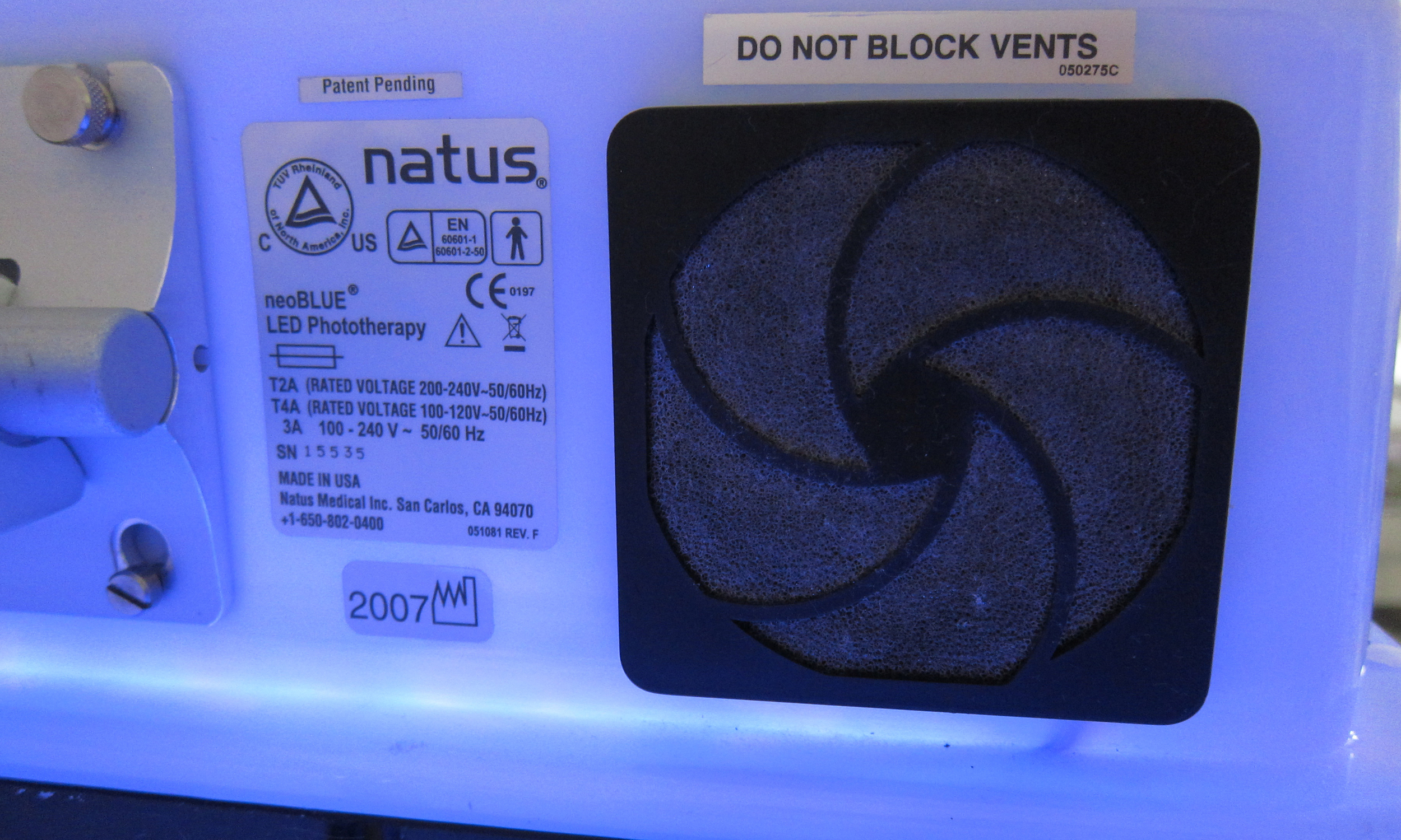 The vent for the Natus NeoBlue LED Overhead Phototherapy, one of the most popular phototherapy devices used in the United States. An internal fan helps move air through this vent to cool the electronics.