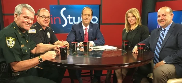 Dr. Richard Hough (far right) and Dr.Kimberly McCorkle were recently part of a panel for the taping of inStudio with host Jeff Weeks. Escambia County Sheriff David Morgan and Pensacola Police Chief Tom Lyter. The group discussed "Law enforcement in a tech-savvy world."