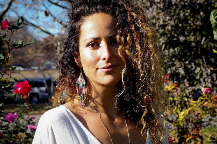 Nicole Adriana Casanova, Soul Architect, a 200 RYT Yoga Alliance certified, a certified Reiki Master in the Usui and Karuna Reiki Riojo, a Human Movement and Meditation teacher, and Magical Awakening Practitioner. 