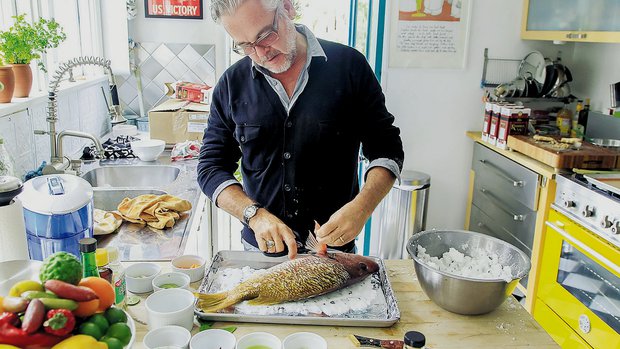 Chef Andrew Spurgin preparing snapper (photo by Eduardo Conteras)